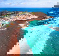 Main Beach North Stradbroke Island Minjerribah - Tourism Canberra