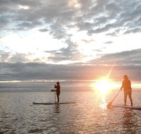 Sunrise Paddleboarding Group Lesson at Palm Cove Beach - Tourism Canberra