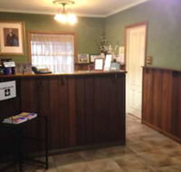 Charles Rasp Motor Inn  Cottages - Tourism Canberra