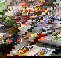 Brown Cardigan - Tourism Canberra