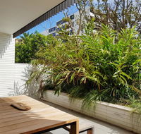 Executive Living in this Chic Garden Apartment - Tourism Canberra