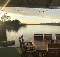 Shack built over the Murray River - Tourism Canberra