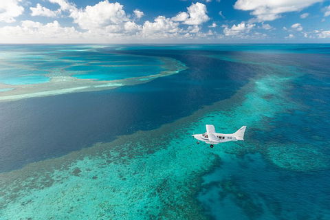 Great Barrier Reef Scenic Flight And Ocean Rafting Whitehaven Beach Day Trip - Tourism Canberra 3
